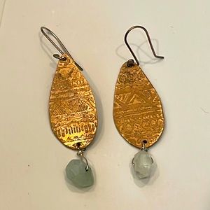 One of a kind stamped brass earrings with raw aquamarine. Really beautiful.